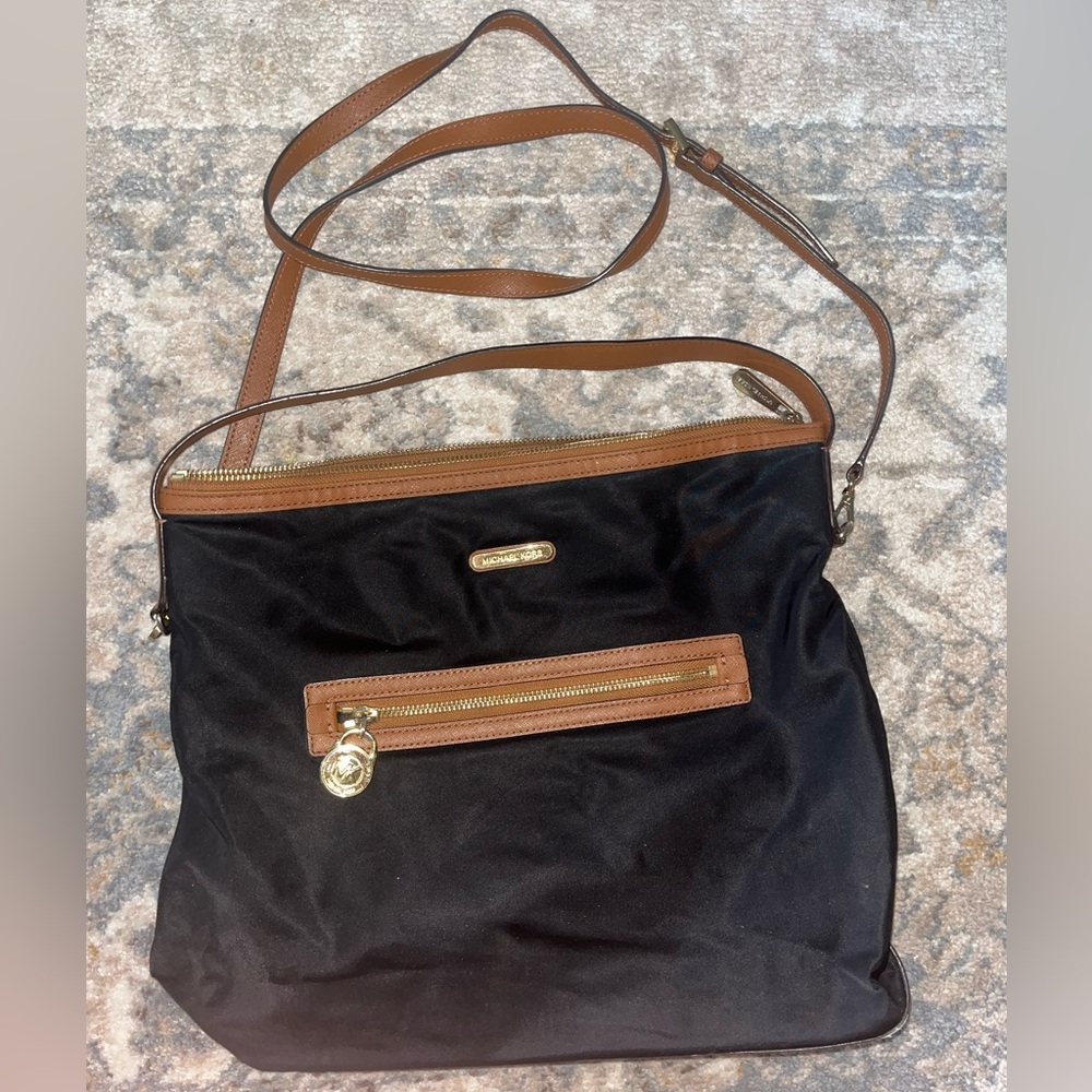 Michael Kors black crossbody bag with camel accents
